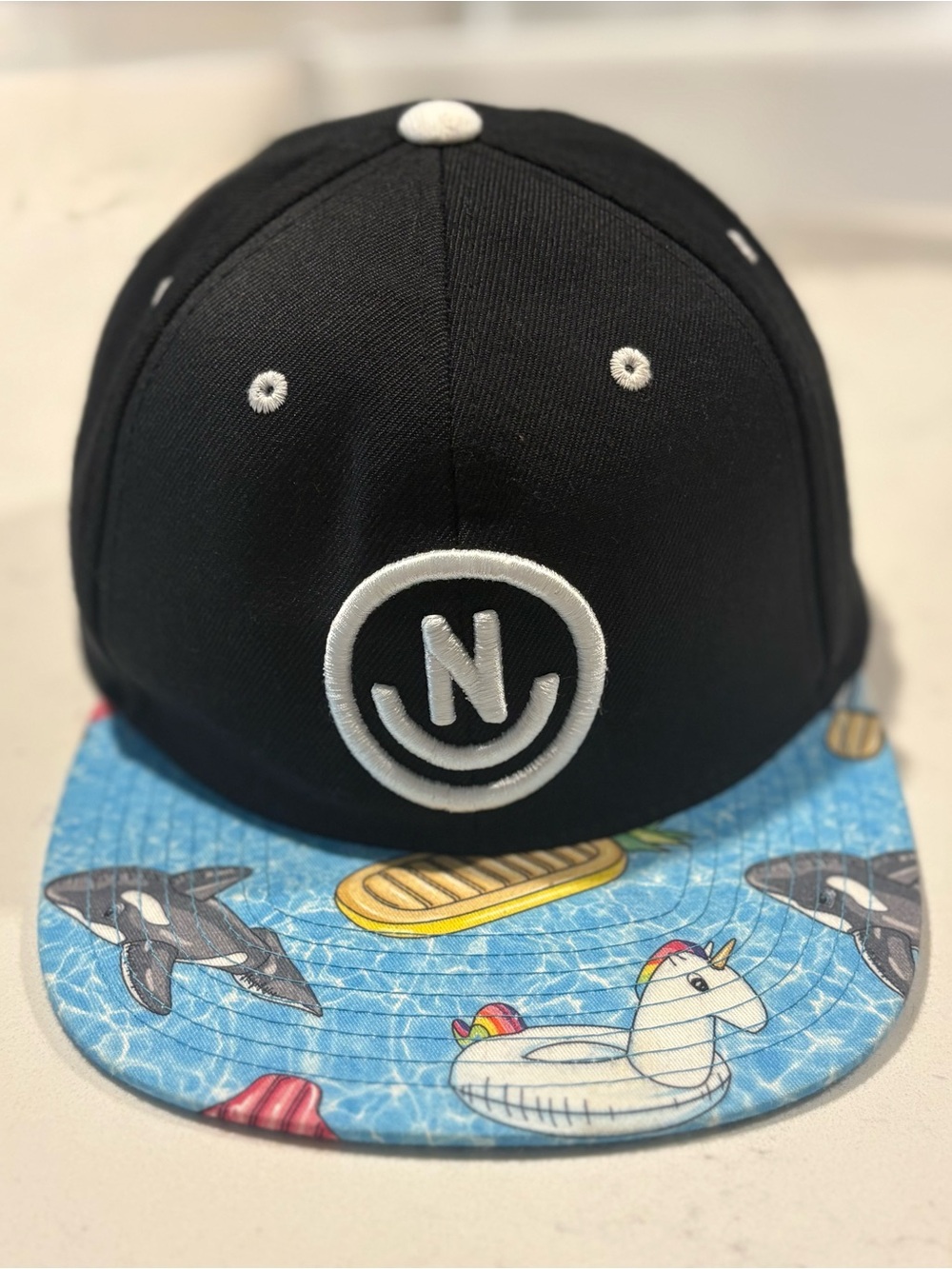 Neff Black Hat with Blue Pool-Print Brim